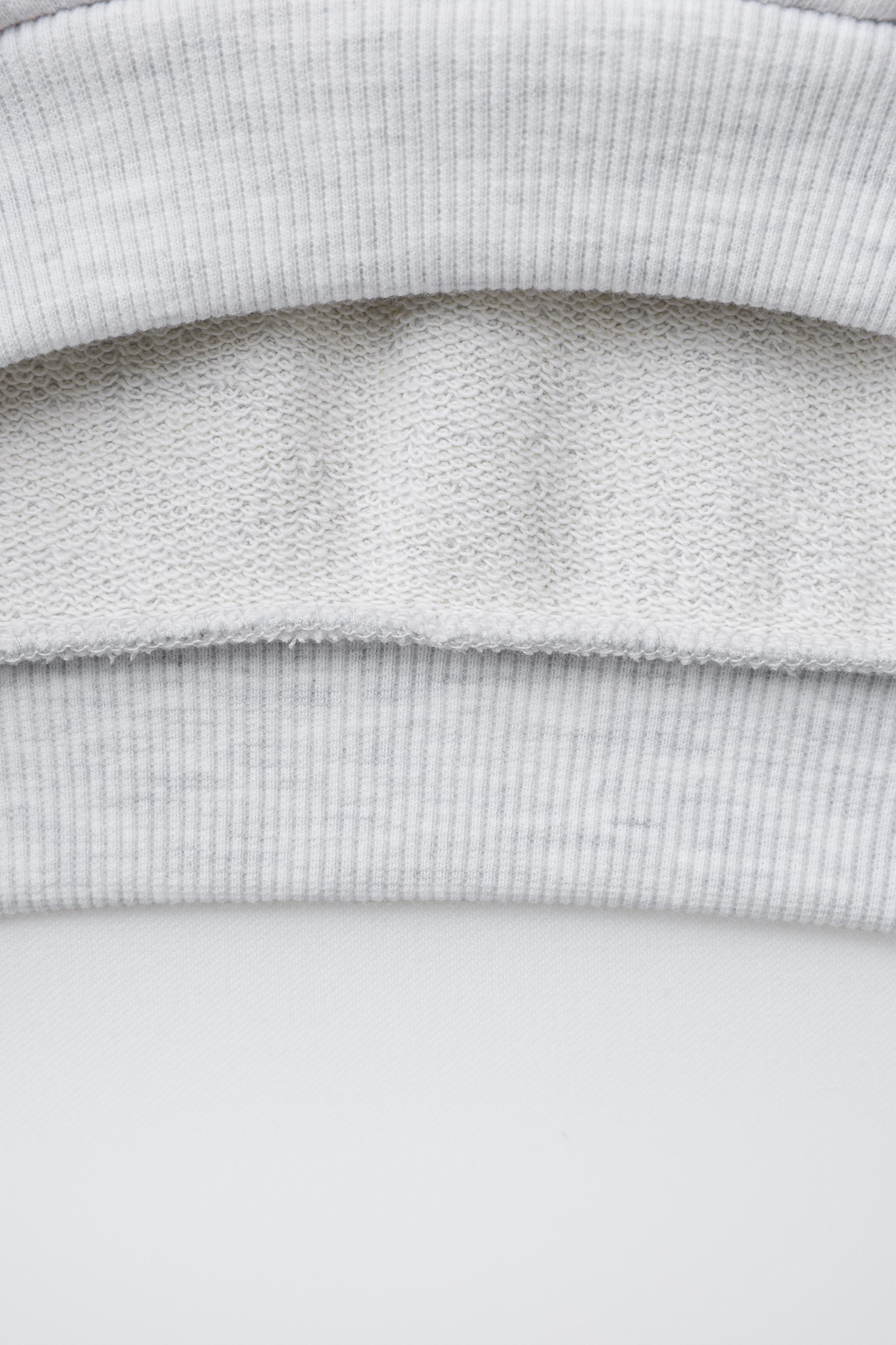 EMBROIDERED LABEL POLO SWEATSHIRT